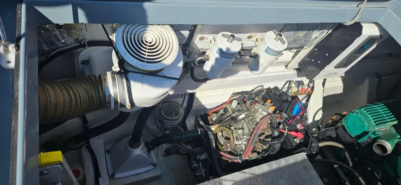  Yacht Photos Pics Engine compartment of a 2019 Sunreef 40 Power yacht, showcasing mechanical components and wiring.