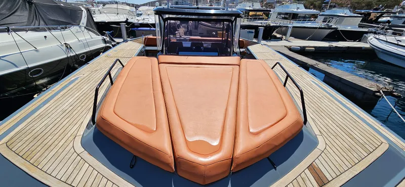  Yacht Photos Pics Sunreef 40 Power 2019 yacht with spacious deck and luxurious seating at marina.