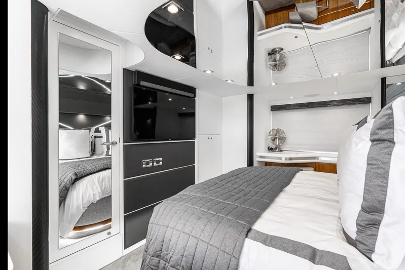  Yacht Photos Pics Luxurious Sunseeker Predator 68 yacht bedroom interior, 2021 model, featuring modern design and elegant decor.