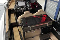 2022 Zar Formenti 85 SL boat interior with sleek dashboard and beige seating.
