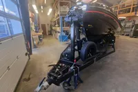 2022 Zar Formenti 85 SL boat on trailer in a workshop setting.