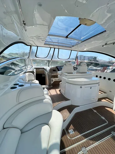 Cla Cla Yacht Photos Pics Luxurious 2011 Cruisers Yachts 560 Express interior with sleek design and spacious seating.