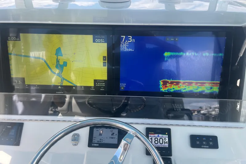 Bluefin Yacht Photos Pics Dashboard of 2017 SeaVee 370Z with Garmin navigation and sonar displays.