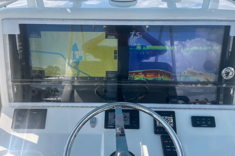 Bluefin Yacht Photos Pics 2017 SeaVee 370Z boat dashboard with navigation and sonar displays.