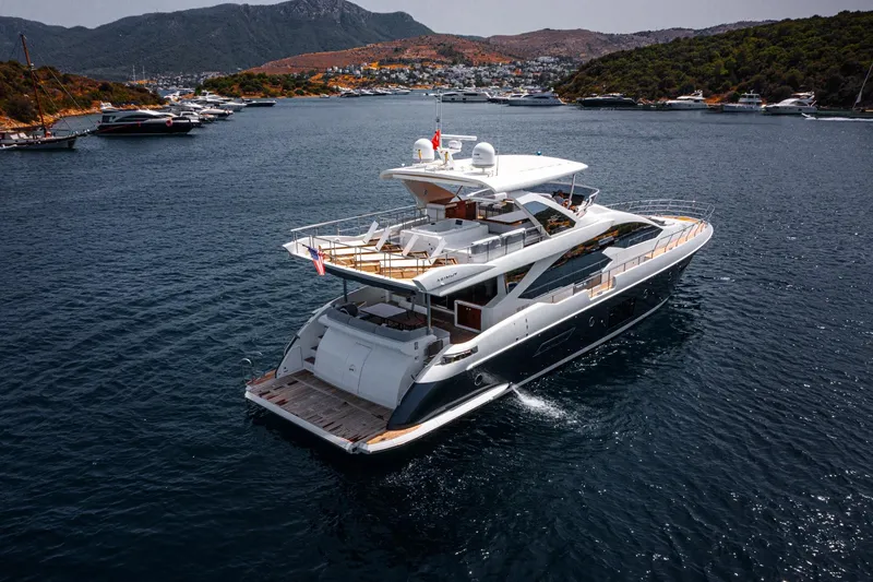  Yacht Photos Pics Luxurious 2014 Azimut 80 yacht cruising in scenic coastal waters.