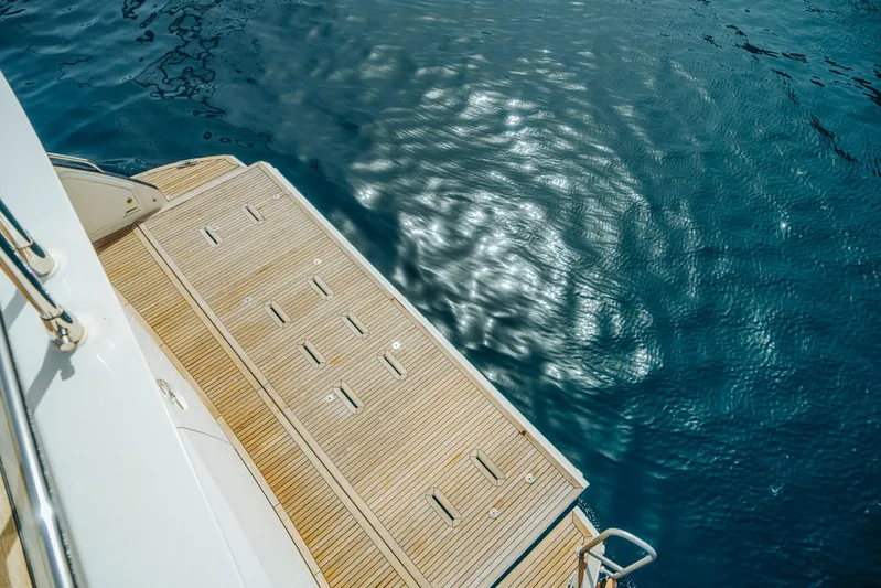  Yacht Photos Pics Deck of 2014 Azimut 80 yacht with sparkling water reflection.