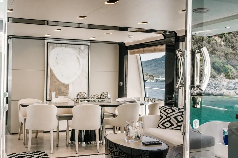  Yacht Photos Pics Luxurious interior of 2014 Azimut 80 yacht with elegant dining area and scenic view.