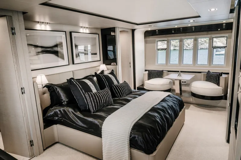  Yacht Photos Pics Luxurious bedroom interior of 2014 Azimut 80 yacht with elegant decor and large windows.