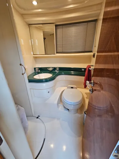 Bella Vita Yacht Photos Pics Bathroom interior of 2003 Azimut 46 MY yacht with modern fixtures.