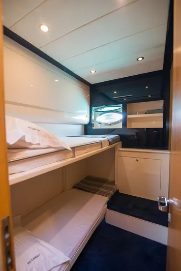  Yacht Photos Pics Interior of 2000 Riva 70 Dolcevita yacht with cozy bunk beds.