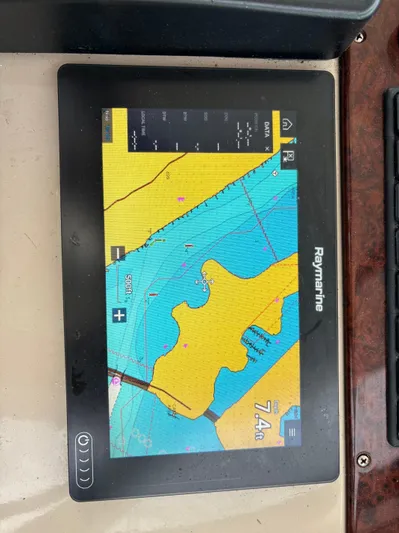  Yacht Photos Pics Raymarine navigation display on 2004 Riviera 4000, showing nautical chart and depth reading.