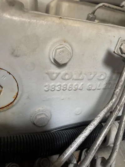  Yacht Photos Pics Close-up of a Volvo engine part in a 2004 Riviera 4000 boat.