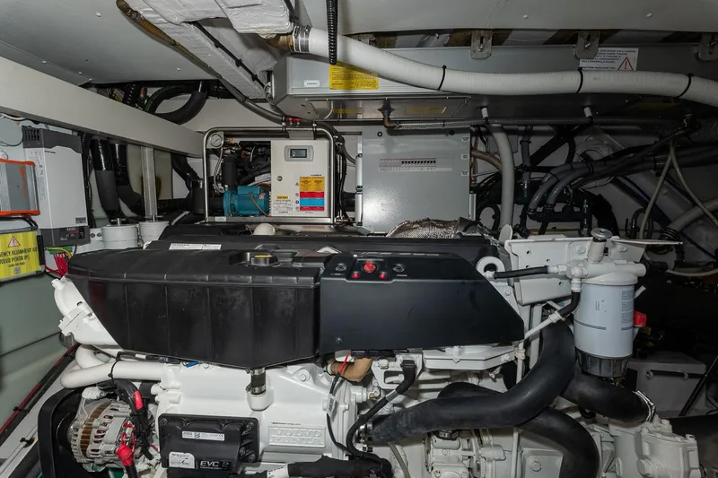II Zoes Yacht Photos Pics Engine room of 2023 Azimut Fly 53 yacht, showcasing complex machinery and components.