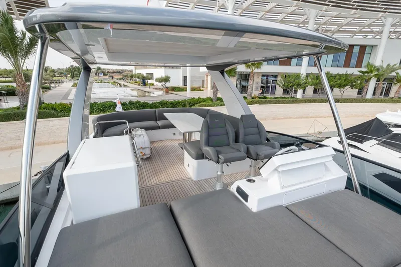 II Zoes Yacht Photos Pics 2023 Azimut Fly 53 yacht with spacious deck and modern seating area.