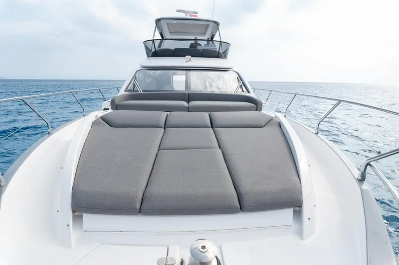 II Zoes Yacht Photos Pics 2023 Azimut Fly 53 yacht with spacious sunbathing deck on open sea.
