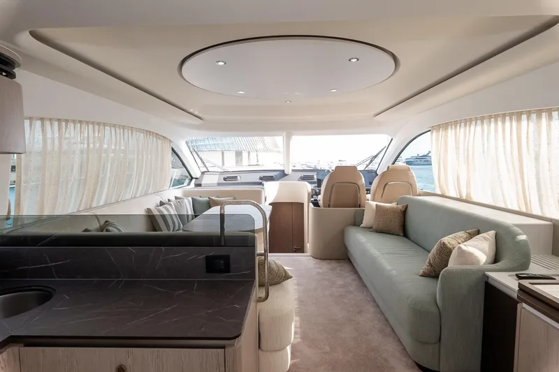 II Zoes Yacht Photos Pics Luxurious interior of 2023 Azimut Fly 53 yacht with elegant seating and modern design.
