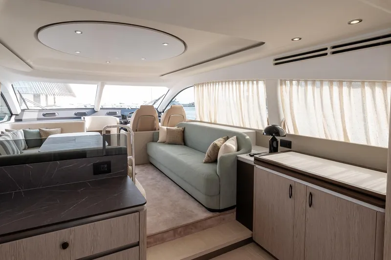 II Zoes Yacht Photos Pics Luxurious interior of 2023 Azimut Fly 53 yacht with elegant seating and modern design.