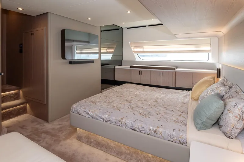 II Zoes Yacht Photos Pics Luxurious bedroom interior of 2023 Azimut Fly 53 yacht, featuring elegant design and modern amenities.