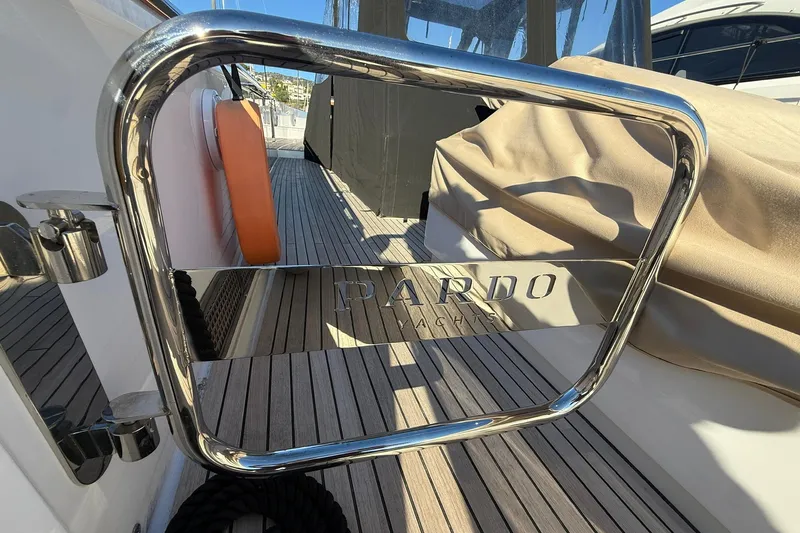 Seoi Yacht Photos Pics 2024 Pardo Yachts P43, polished metal railing, teak deck, luxury yacht detail.