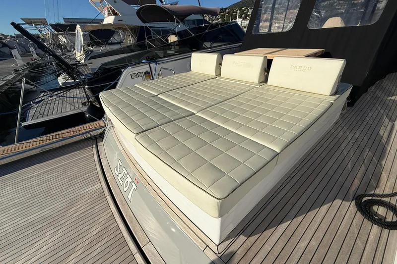 Seoi Yacht Photos Pics 2024 Pardo Yachts P43 luxury yacht with cushioned sun deck at marina.
