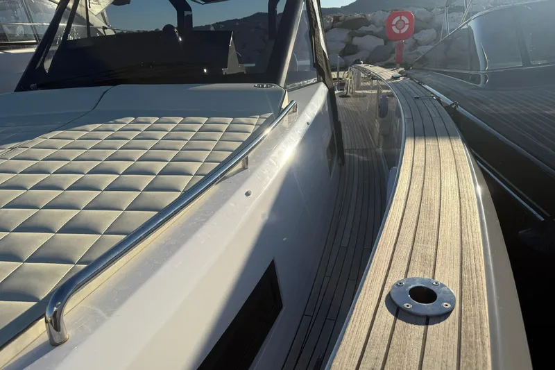 Seoi Yacht Photos Pics 2024 Pardo Yachts P43 deck with cushioned seating and sleek wooden finish.