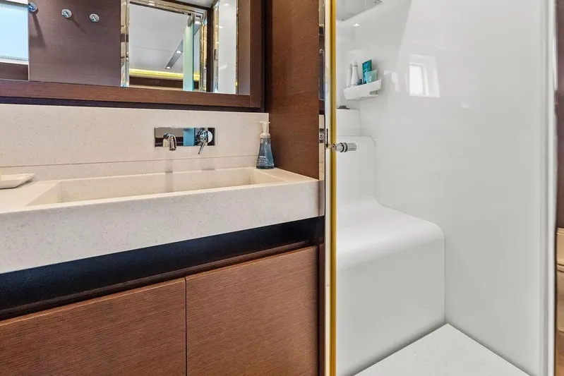 Elevation Yacht Photos Pics Luxurious bathroom in 2016 Prestige 750 yacht with modern sink and shower.
