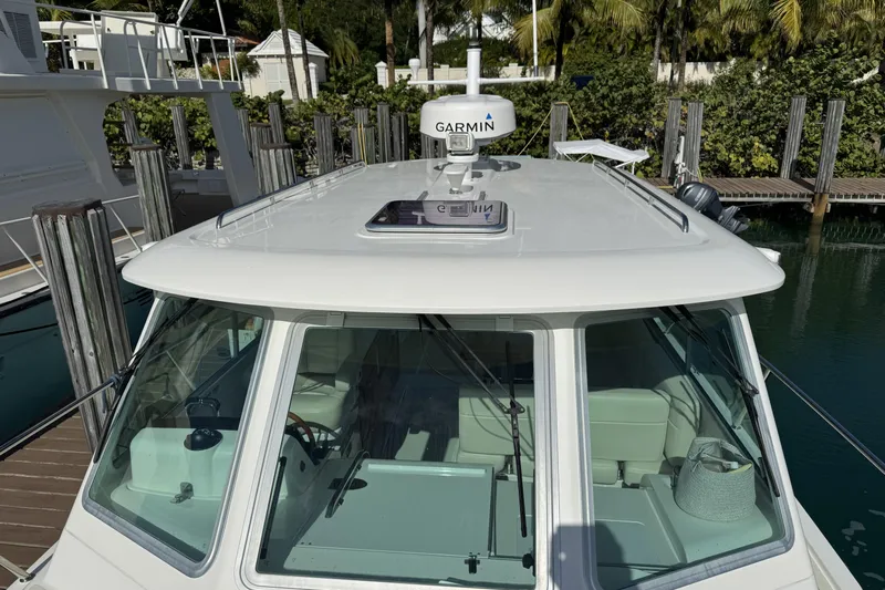 Swell Yacht Photos Pics 2020 Back Cove 34O boat with Garmin radar, docked in a marina.