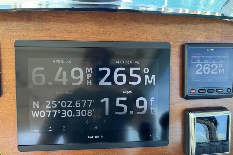 Swell Yacht Photos Pics Garmin navigation display on 2020 Back Cove 34O boat showing speed, heading, and depth.