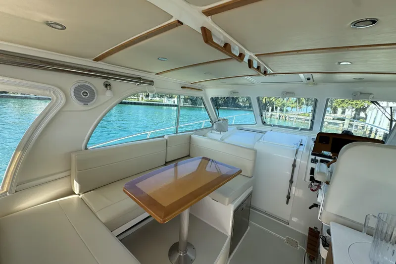 Swell Yacht Photos Pics Interior of 2020 Back Cove 34O yacht with elegant seating and waterfront view.