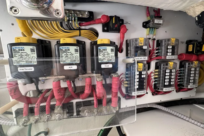 Swell Yacht Photos Pics Electrical panel of a 2020 Back Cove 34O boat with labeled components and wiring.