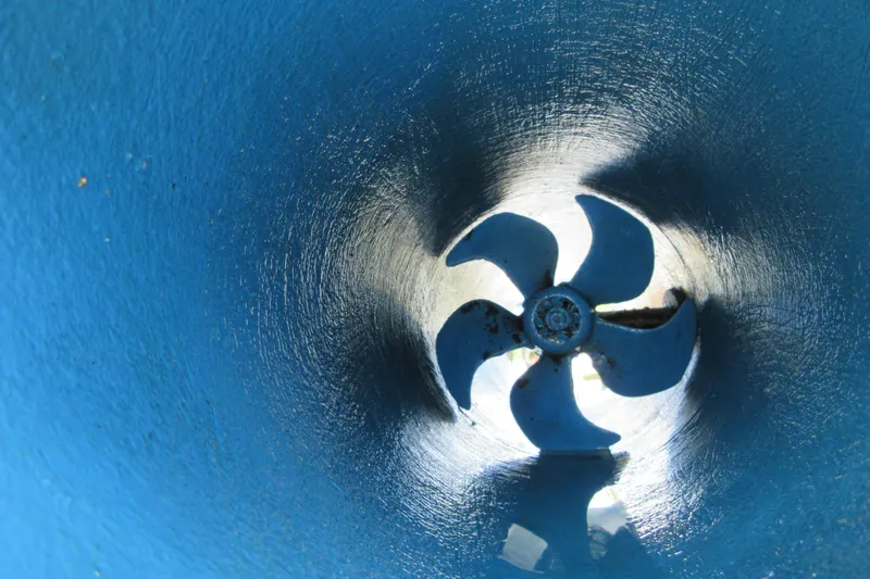Swell Yacht Photos Pics Close-up of a blue boat propeller inside a tunnel, Back Cove 34O, 2020 model.