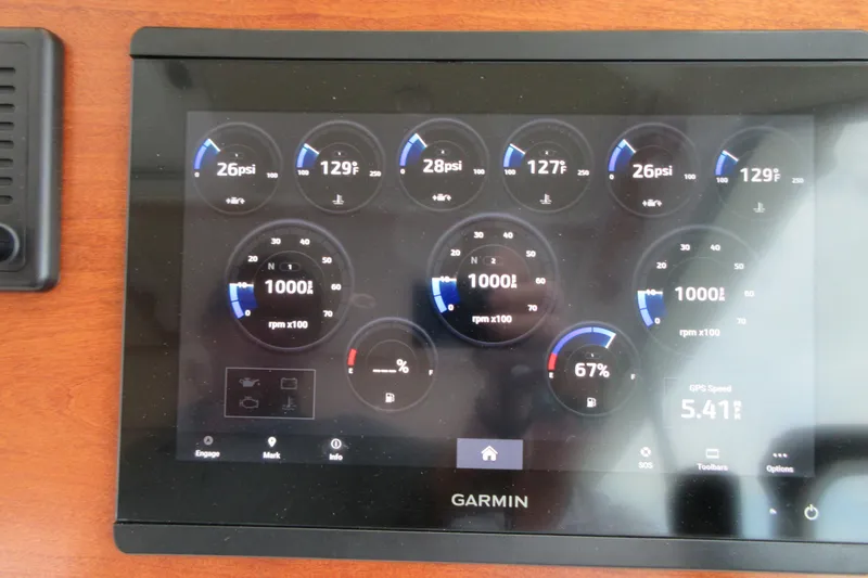 Swell Yacht Photos Pics Garmin display on 2020 Back Cove 34O showing engine metrics and GPS speed.