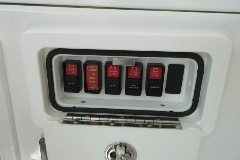 Swell Yacht Photos Pics Control panel of a 2020 Back Cove 34O boat with labeled switches.