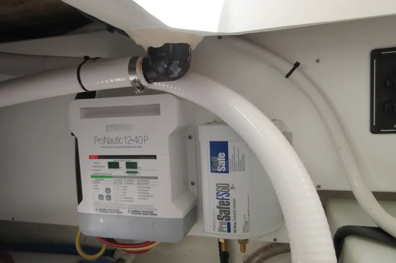 Swell Yacht Photos Pics Electrical components in a 2020 Back Cove 34O boat, featuring ProNautic 12-40P charger.