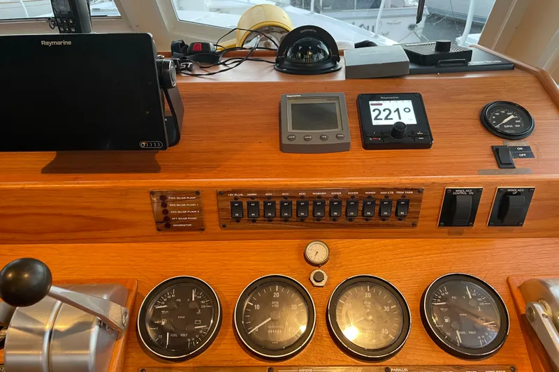 Mary Jean Too Yacht Photos Pics Control panel of a 2003 Mainship 430 Trawler with navigation instruments and gauges.