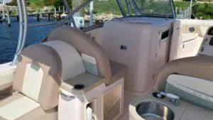  Yacht Photos Pics 2013 Grady-White Freedom 307 boat interior with seating and cup holders.