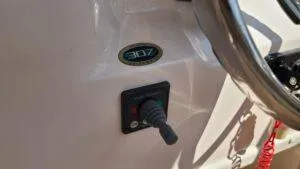 Yacht Photos Pics 2013 Grady-White Freedom 307 boat dashboard with steering wheel and control switch.