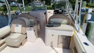  Yacht Photos Pics 2013 Grady-White Freedom 307 boat interior with seating and storage compartments.