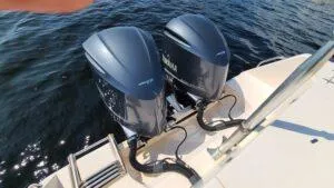  Yacht Photos Pics 2013 Grady-White Freedom 307 boat with dual Yamaha outboard engines on water.