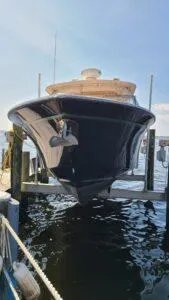  Yacht Photos Pics 2013 Grady-White Freedom 307 boat docked on water, front view.