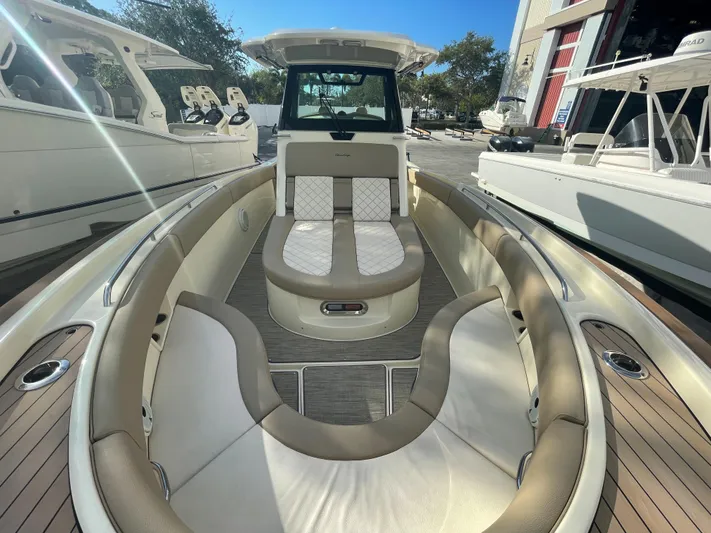  Yacht Photos Pics 2022 Chris-Craft Catalina 30 boat interior with luxurious seating and modern design.