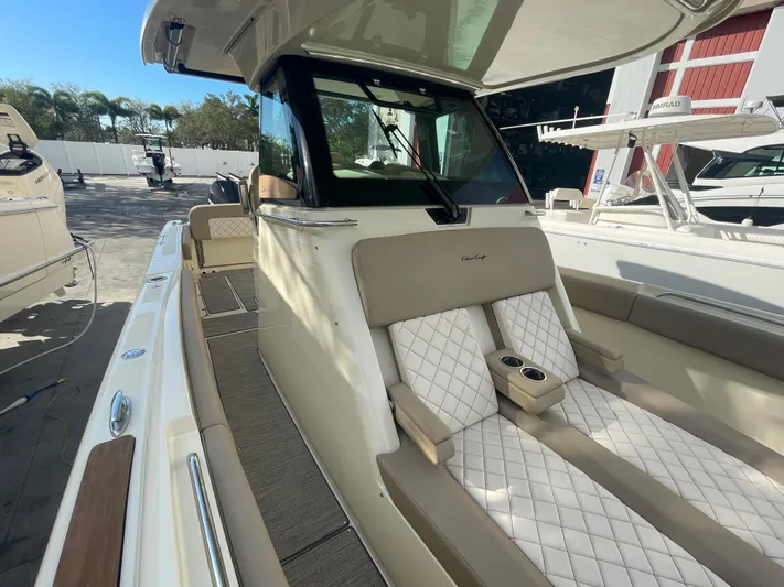  Yacht Photos Pics 2022 Chris-Craft Catalina 30 boat with luxurious seating and modern design.