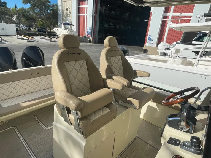  Yacht Photos Pics Luxury seating on 2022 Chris-Craft Catalina 30 boat, featuring elegant design and premium materials.