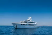 Luxurious 2004 R.B Dereli yacht cruising on a clear blue sea.