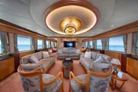 Luxurious yacht interior with elegant seating, panoramic ocean views, and sophisticated lighting, R.B Dereli 2004.