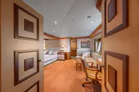 Luxurious yacht interior with elegant furnishings, warm lighting, and modern design, R.B Dereli 2004.