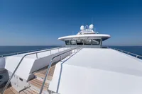 Luxurious R.B Dereli 2004 yacht deck with ocean view and clear blue sky.