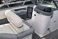 Interior of a 2016 Cobalt 24 boat with white and gray seating.