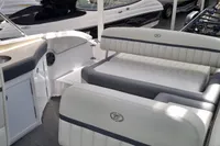 Interior of a 2016 Cobalt 24 boat with white and gray seating.