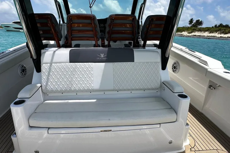  Yacht Photos Pics 2022 Bertram 39 CC boat interior with luxurious seating and ocean view.